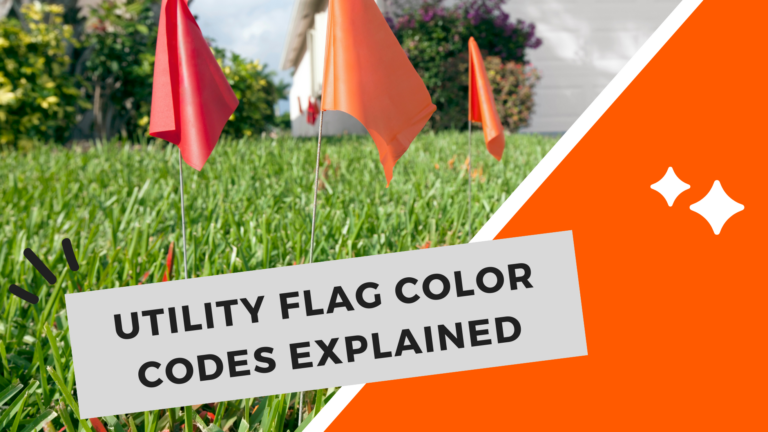 Color-coded utility flags marking the ground to indicate underground utilities such as electrical lines, gas pipes, and communication cables.